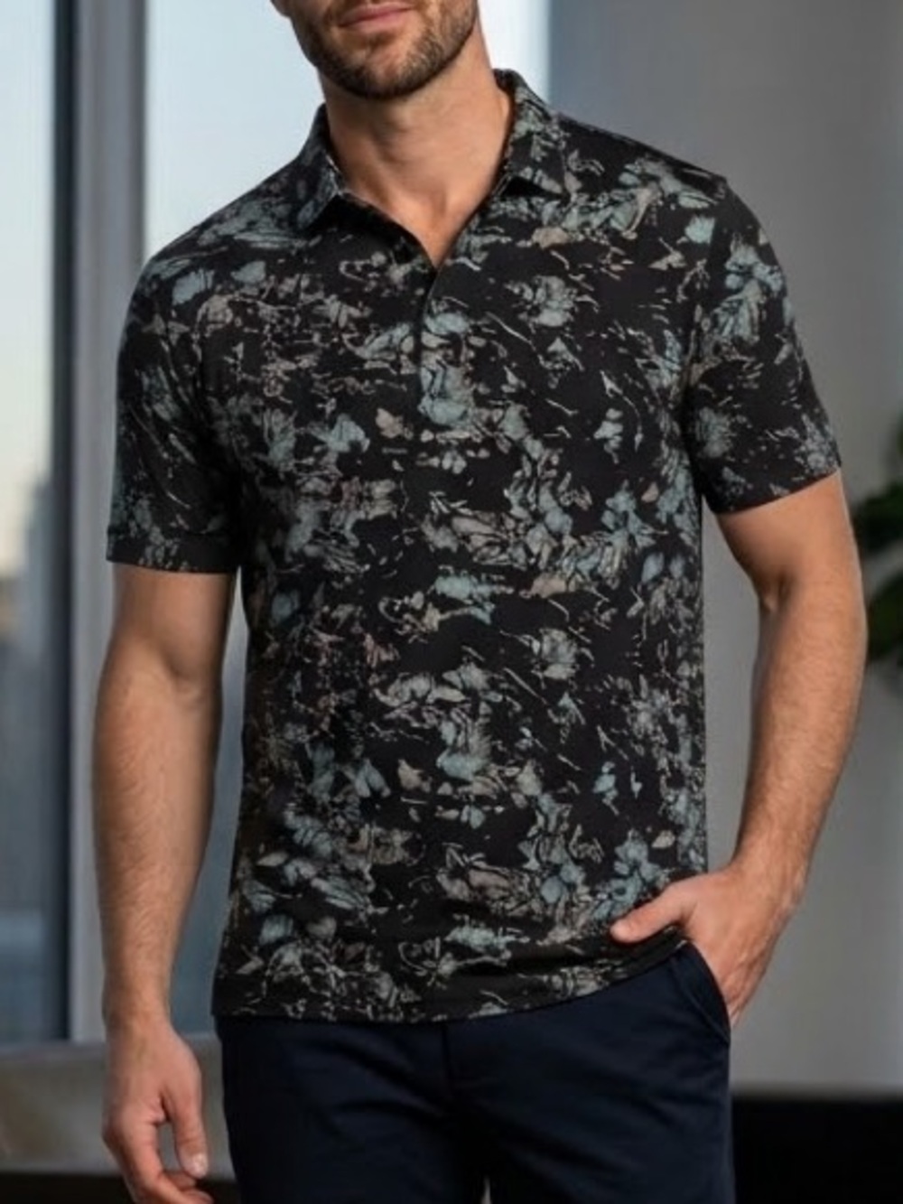Travis Mathew Black Polo with Teal Abstract Pattern